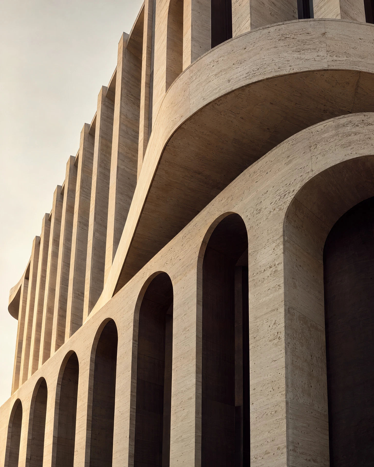 Sculptural ivory architecture with ascending arches and champagne light